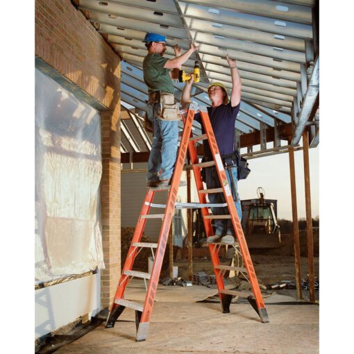 Men working on Werner ladder T7406 in Malaysia